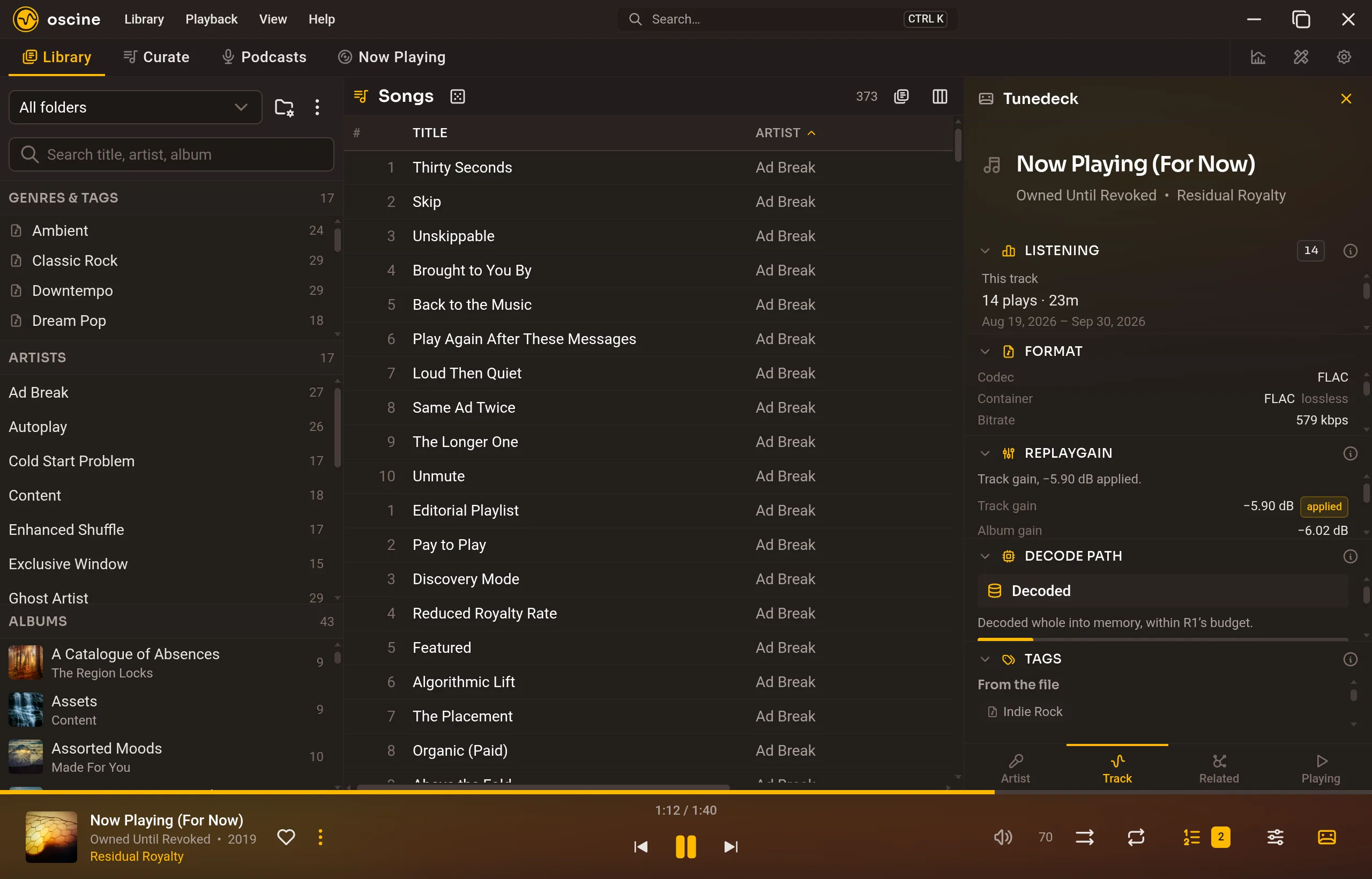 The right-hand drawer open on the Track tab, showing format, ReplayGain, and play counts.